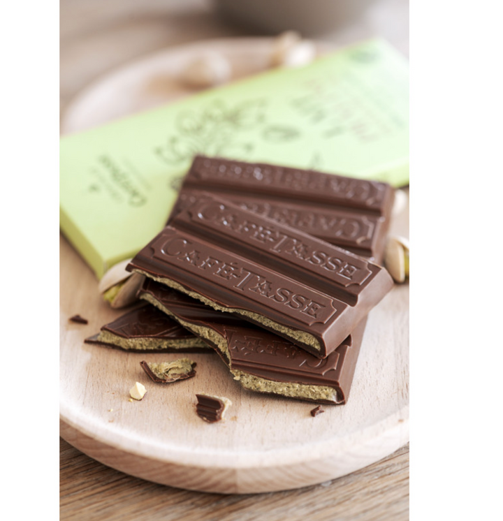 Milk chocolate family bar filled with pistachio praline